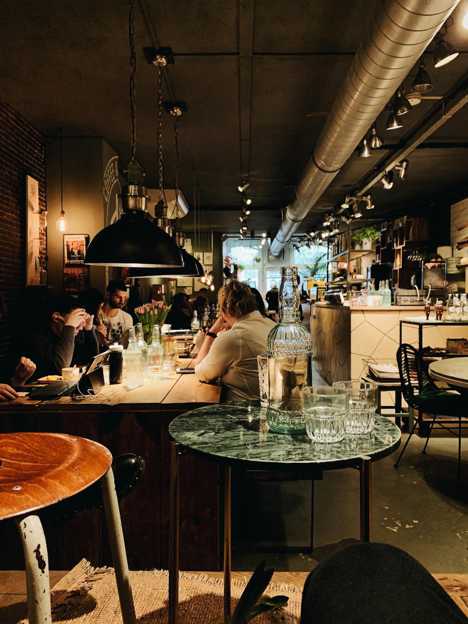 A full, busy restaurant dining room during service
